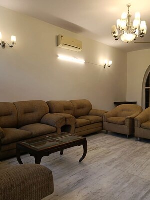 Living Room in 3 BHK Apartment at Pamposh Enclave – for Rent