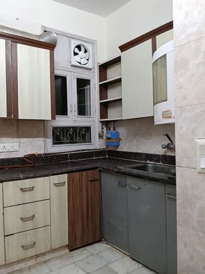 Kitchen in 3 BHK Apartment at Pamposh Enclave – for Rent