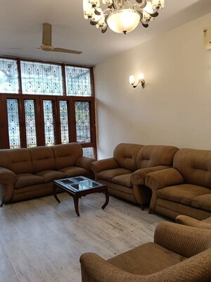 Living Room in 3 BHK Apartment at Pamposh Enclave – for Rent