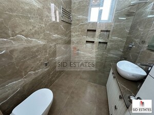 Bathroom in 3 BHK Apartment at Greater Kailash I – for Rent