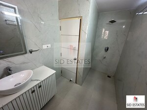 Bathroom in 3 BHK Apartment at Greater Kailash I – for Rent