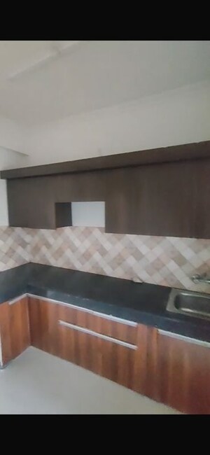 Kitchen in 2 BHK Apartment at Nilaya Greens, Raj Nagar Extension – for Sale