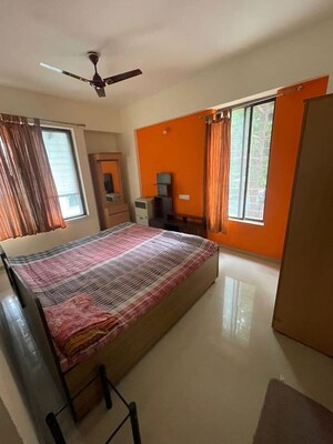 Bedroom in 2 BHK Apartment at Gulmohar Goldcoast, Kharadi – for Rent