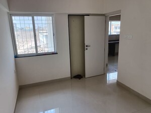 Room in 2 BHK Apartment at Zen Elite, Kharadi – for Rent