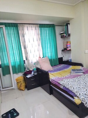 Bedroom in 2 BHK Apartment at New Look Apartment CHS, Dadar East – for Rent