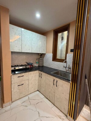 Kitchen in 2 BHK Apartment at Freedom Fighters Enclave – for Rent