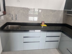 Kitchen in 2 BHK Apartment at Zen Elite, Kharadi – for Rent