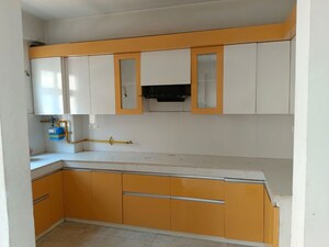 Kitchen in 3 BHK Apartment at Uninav Eden, Raj Nagar Extension – for Sale