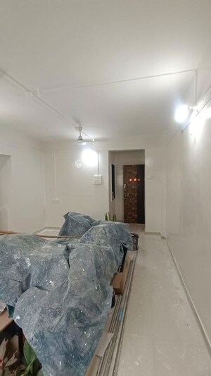Living Room in 1.5 BHK Apartment at Shree Mangal CHS, Dhankawadi – for Rent