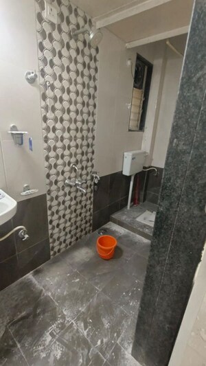 Bathroom in 1.5 BHK Apartment at Shree Mangal CHS, Dhankawadi – for Rent