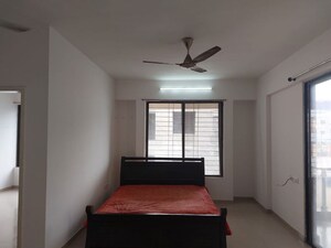 Bedroom in 2 BHK Apartment at Gulmohar Goldcoast, Kharadi – for Rent