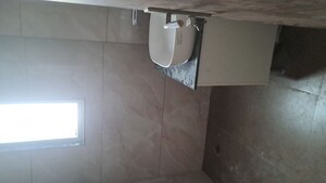 Bathroom in 4 BHK Apartment at Arya Nagar – for Sale