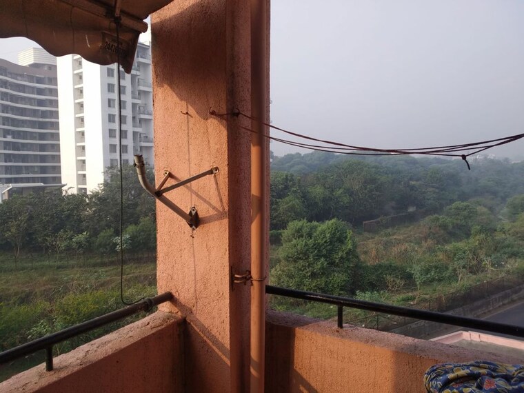 Balcony, magarpatta-city-heliconia 1 Bedroom 450 Sq.Ft. Apartment In Hadapsar Pune 10614717