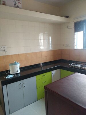 Kitchen in 1 BHK Apartment at Magarpatta City Heliconia, Hadapsar – for Rent