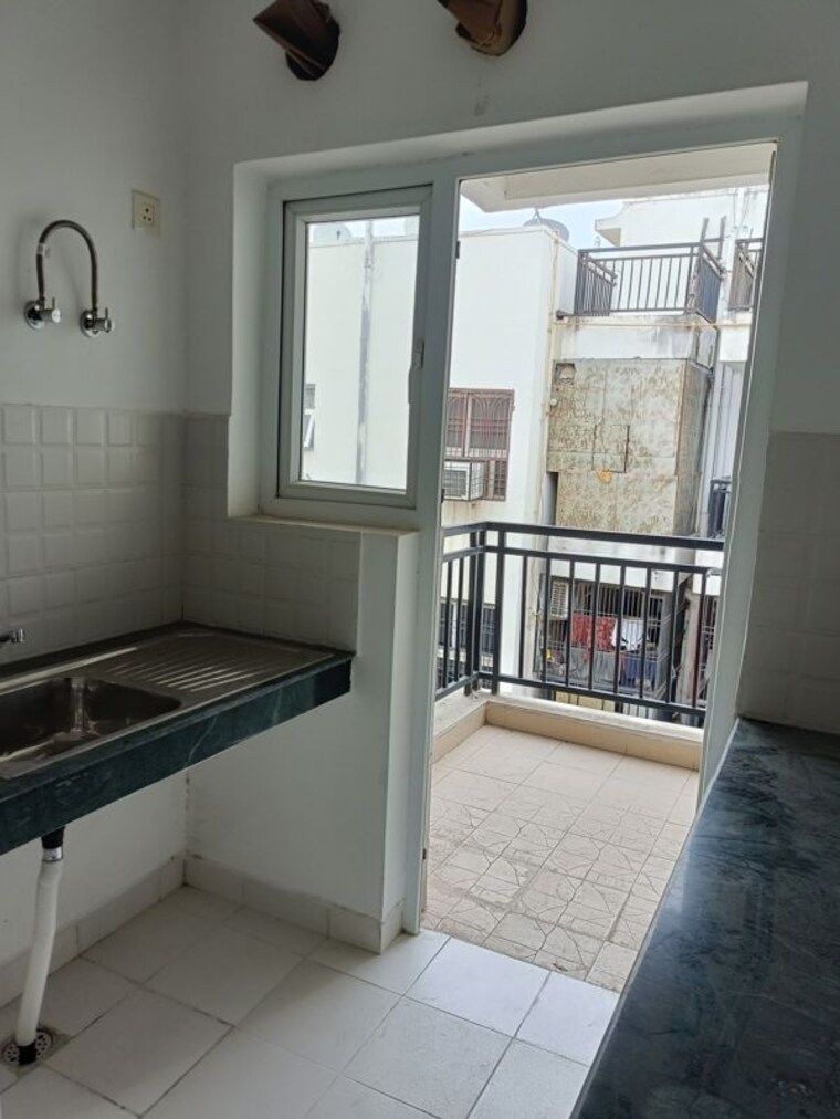 Kitchen, bptp-park-elite-floors 3 Bedroom 1300 Sq.Ft. Apartment In Sector 85 Faridabad 10614806