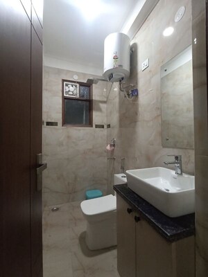Bathroom in 1 BHK Builder Floor at Freedom Fighters Enclave – for Rent