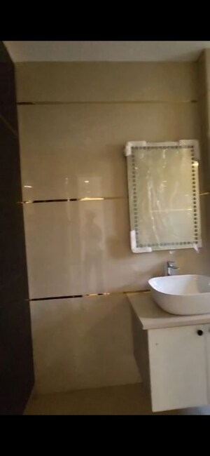 Bathroom in 3 BHK Builder Floor at Ansal API Esencia, Sector 67 – for Sale