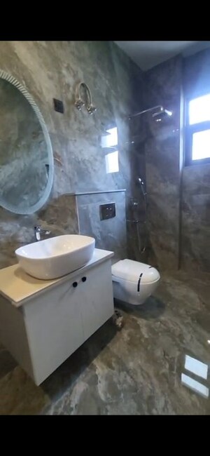 Bathroom in 3 BHK Builder Floor at Ansal API Esencia, Sector 67 – for Sale