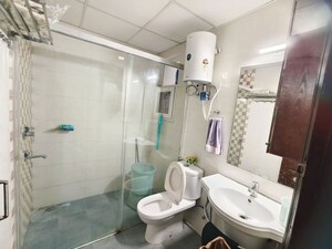 Bathroom in 3 BHK Builder Floor at Omaxe Silver Birch, North Mullanpur – for Rent