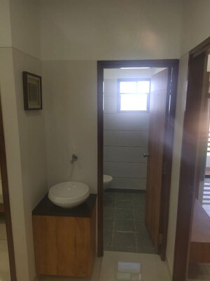 Bathroom in 3 BHK Apartment at Radhe Shyam Harmony, Gotri – for Sale