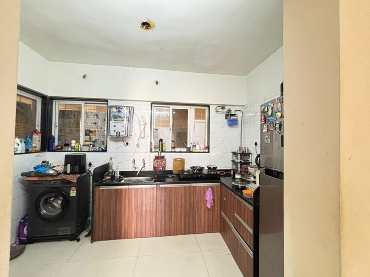 Kitchen, sukhwani-skylines 2 Bedroom 733 Sq.Ft. Apartment In Wakad Pune 10614947