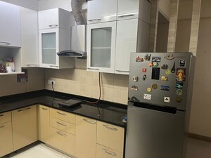 Kitchen in 3.5 BHK Apartment at Satya The Hermitage, Sector 103 – for Sale