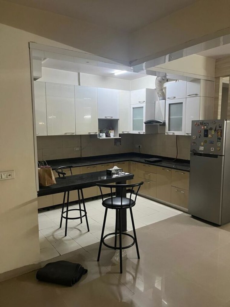 Kitchen, satya-the-hermitage 3.5 Bedroom 2000 Sq.Ft. Apartment In Sector 103 Gurgaon 10614971