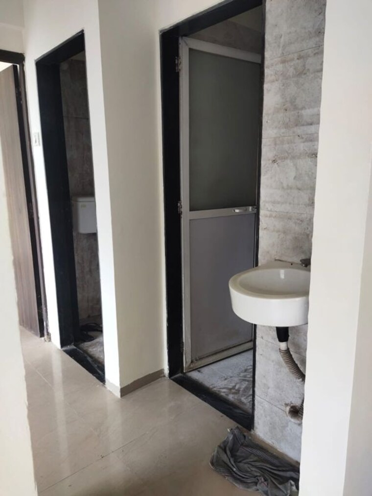 Bathroom, rati-vighnarta 1 Bedroom 700 Sq.Ft. Apartment In Wahal Navi Mumbai 10614997