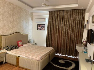 Bedroom in 4 BHK Builder Floor at Ansal API Esencia, Sector 67 – for Sale