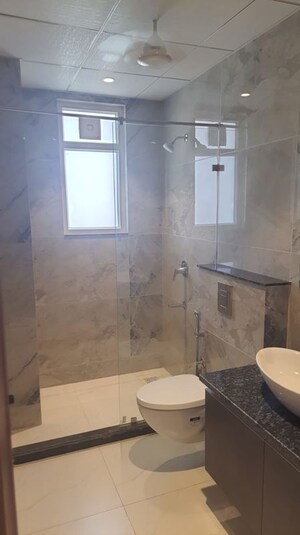 Bathroom in 4 BHK Builder Floor at Ansal API Esencia, Sector 67 – for Sale