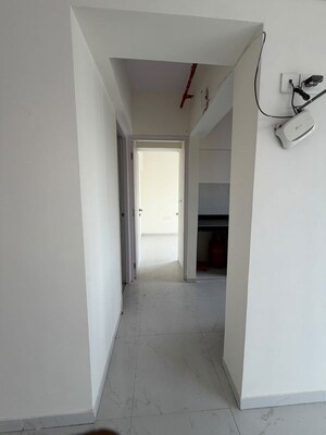 Building Lobby in 1.5 BHK Apartment at Runwal Gardens, Dombivli East – for Sale