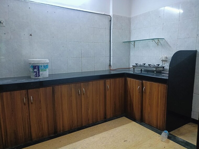 Kitchen, serenity-complex 3 Bedroom 900 Sq.Ft. Apartment In Andheri West Mumbai 10615104