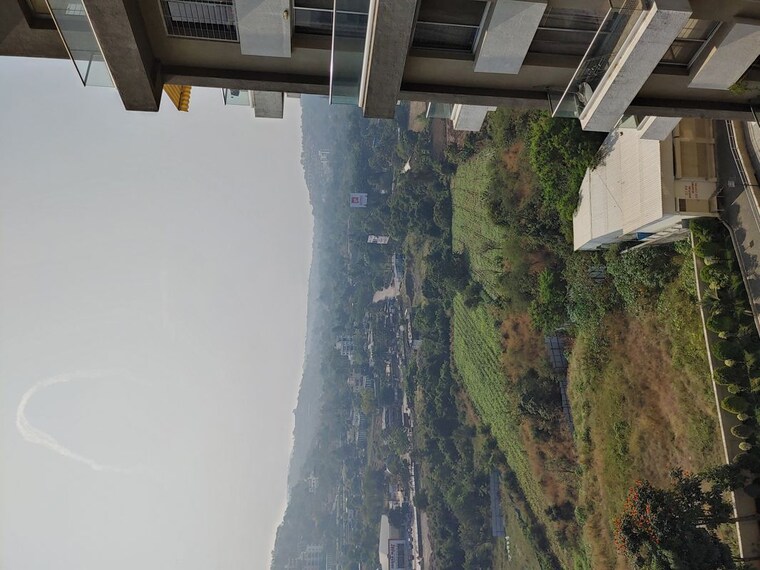 Balcony, axis-paradigm-whistling-meadows 2 Bedroom 1000 Sq.Ft. Apartment In Paud Road Pune 10615144