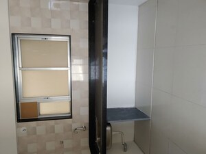 Bathroom in 3 BHK Apartment at Axis Paradigm Whistling Meadows, Paud Road – for Rent