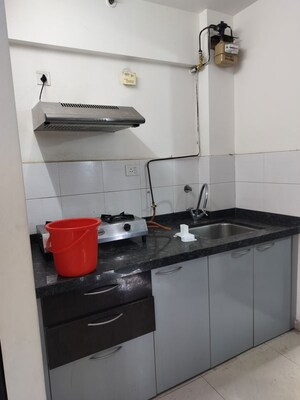 Kitchen in 1 RK Apartment at Amanora Future Towers, Hadapsar – for Rent