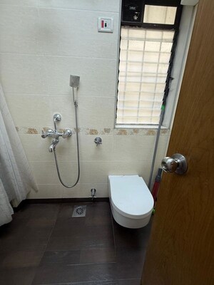 Bathroom in 2 BHK Apartment at Atul Trans Residency, Andheri East – for Sale