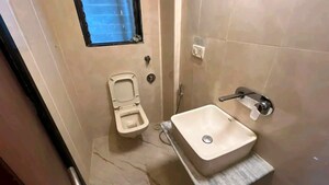 Bathroom in 3 BHK Apartment at Dattani Shelter, Goregaon West – for Rent