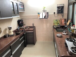 Kitchen in 1 BHK Apartment at Rahu Nisarg Society, Warje – for Rent