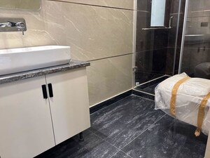 Bathroom in 4 BHK Builder Floor at Sector 22 – for Rent