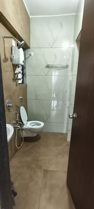 Bathroom in 1 BHK Apartment at Raunak Unnathi Woods Phase 7 A And B, Ghodbunder Road – for Rent