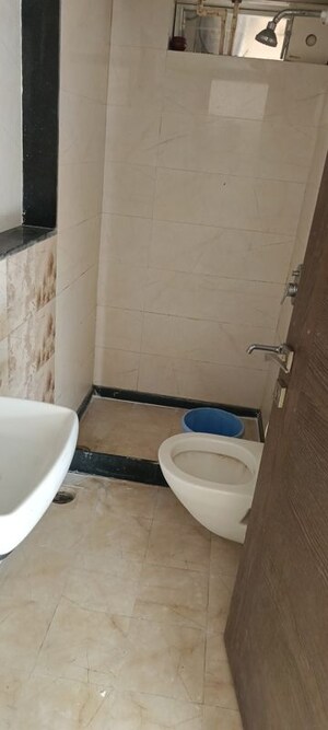 Bathroom in 2.5 BHK Apartment at MV Labh Samarth Heights, Andheri West – for Sale