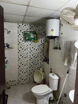 Bathroom in 2 BHK Apartment at Nimbus Express Park View, Chi V Greater Noida – for Rent