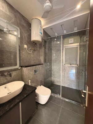 Bathroom in 4 BHK Builder Floor at Ansal Sushant Lok I, Sector 43 – for Rent