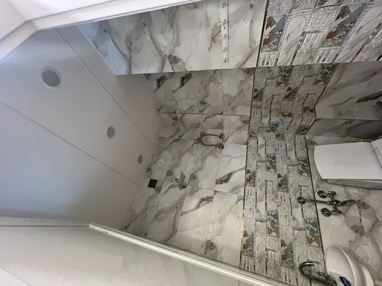 Bathroom, dwarka mor 3 Bedroom 900 Sq.Ft. Builder Floor In Dwarka Mor Delhi 10615374