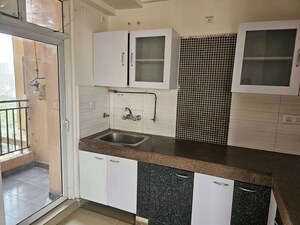 Kitchen in 3.5 BHK Apartment at Exotica Dreamville, Sector 16c Greater Noida – for Rent