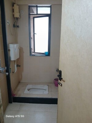 Bathroom in 1 BHK Apartment at Panchavati 1 Apartment, Malad East – for Rent