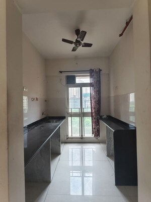 Kitchen in 1.5 BHK Apartment at Vijay Orovia, Ghodbunder Road – for Sale