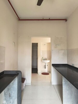 Kitchen in 1.5 BHK Apartment at Vijay Orovia, Ghodbunder Road – for Sale