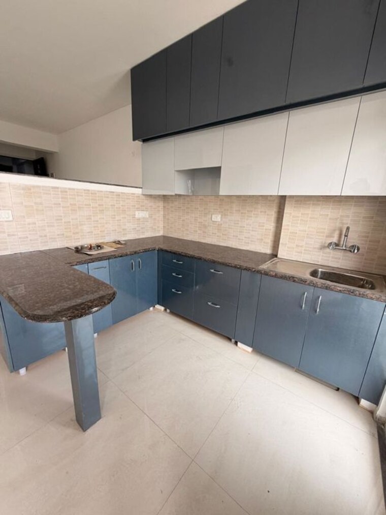 Kitchen, home-and-soul-beetle-lap 2 Bedroom 1000 Sq.Ft. Apartment In Sector 25 Yamuna Expressway Greater Noida 10615447