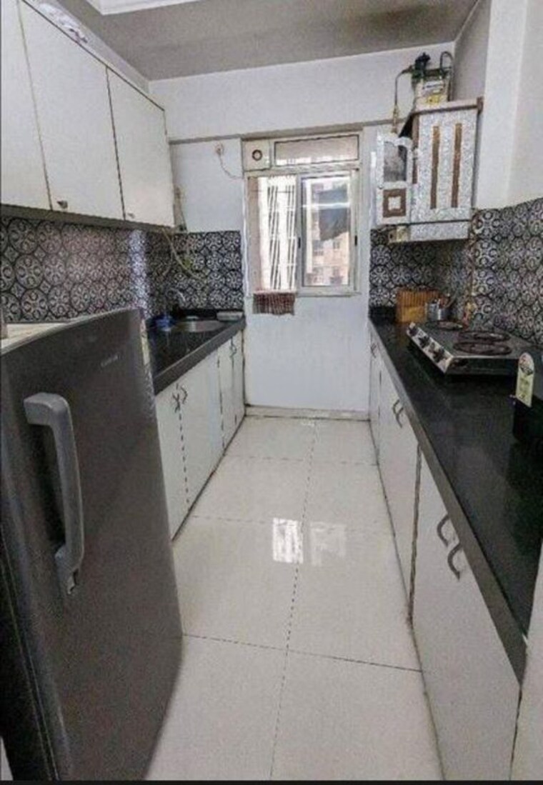 Kitchen, lodha-amara 1 Bedroom 550 Sq.Ft. Apartment In Kolshet Road Thane 10615588